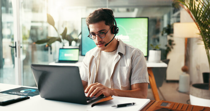 Man, headset and laptop in call center for customer service, assistance and contact in agency. IT guy, tech support and computer in office for help, problem solving and telecommunication for advice