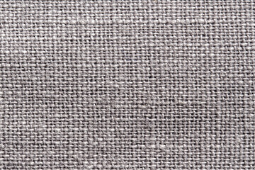 close up detail Knitted texture of grey linen textile material, Mesh pattern, Textile material