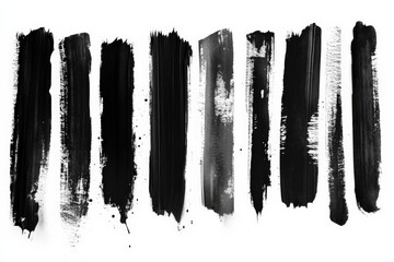 Various black paint strokes on a white background showcasing artistic texture and contrast in contemporary art