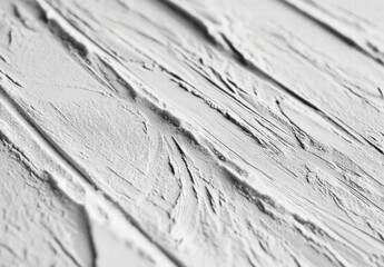 Fototapeta premium The image is a close up of a white wall with a textured surface