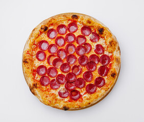 Freshly baked pepperoni pizza ready to be served at a cozy restaurant