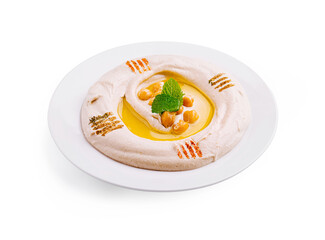 Creamy hummus served on a white plate garnished with chickpeas and olive oil