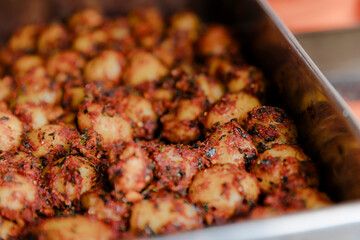 A buffet table full of different types of fish meat and salads at a wedding or party in the hotel restaurant.
