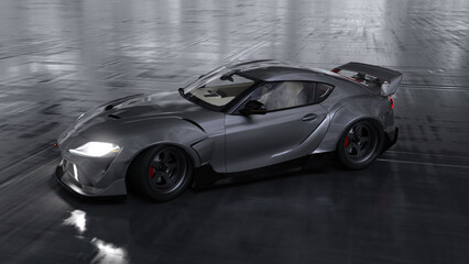 Silberfarbener Sportwagen auf einem metallischen Boden