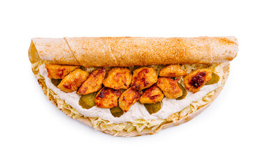 Delicious chicken wrap with fresh toppings and creamy sauce served on a flatbread