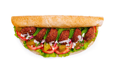 Healthy falafel wrap filled with fresh vegetables served on a white background