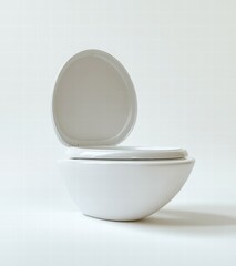 A toilet is shown with the lid open, revealing a white bowl