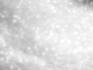 Background grey bokeh abstarct white beige circle light texture bubble blur pattern defocused glowing sparkle snow glitter snowflake magig backdrop ecosystem foreground card silver space decoration.
