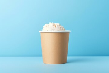 Creamy ice cream served in a disposable cup, perfect for a refreshing treat on a summer day