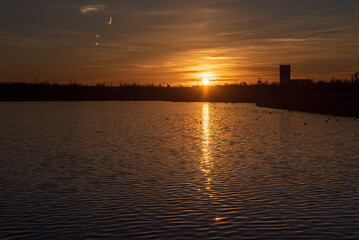Naklejka premium Sunset on Karvinske more lake near Karvina city in Czech republic