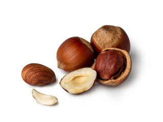 Hazelnuts and their shells scattered on a clean surface inviting culinary exploration