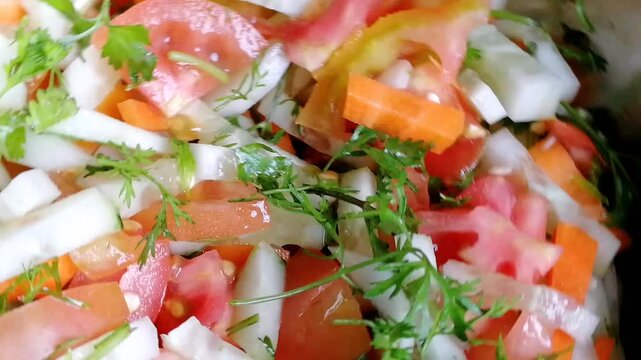 Mixed vegetables salad. Most desired food item in India, Pakistan, Greece, Turkey, Italy, Mexico, and Thailand. Healthy Organic salad made with fresh tomato, cucumber, onion, chilli, capsicum etc