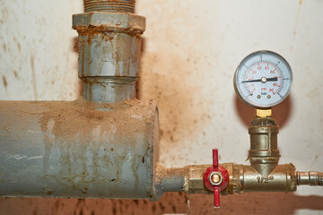 Pressure sensor, meter and faucet on the water pipe in the basement
