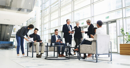 Collaboration, development and meeting with business people in lobby of office for planning or...