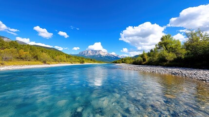Breathtaking blue river flowing through serene mountain valley