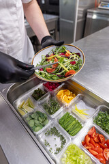 Chef preparing fresh salad