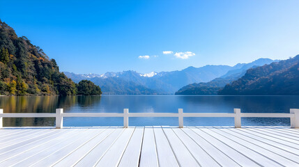 Obraz premium Serene lake view from white dock; autumn mountain backdrop; peaceful nature scene; ideal for travel brochures