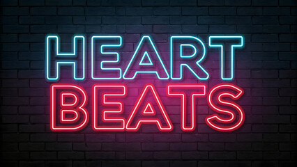 This image showcases the phrase "HEART BEATS" rendered in a bold, illuminated neon sign against a dark brick wall background.