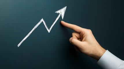 Hand Pointing at Growth Chart on Dark Background for Business Insights