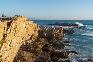View of the rugged, rocky coastline along the Cliff Path at  Hermanus, Whale Coast, Overberg, Western Cape, South Africa.