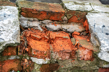 Destruction of a brick wall under the influence of the environment.