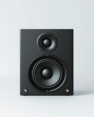 Fototapeta premium Modern Black Audio Speaker on Minimalist Background, Front View