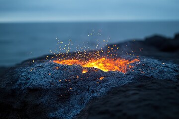 Lava erupts from the molten core of a volcano near the ocean at twilight, casting a warm glow against the cool backdrop