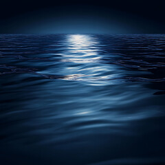 Dark blue abstract background. Reflection of light on a smooth surface of water with small waves.