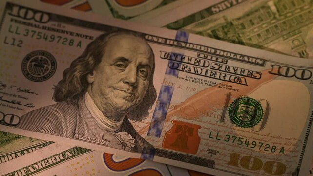 Hundred USD cash macro view. 100 Dollar Cash Stop Motion. Background Bill Sign USA Fiat Money. Hundred Dollar Closeup. Stop Motion Texture of 100 USD Bills. Concept Finance Business Investment Success