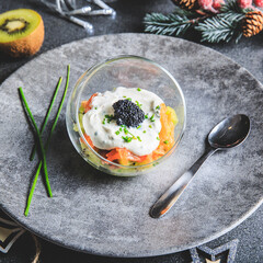 Kiwi salmon cream cheese and lumpfish roe verrine in studio