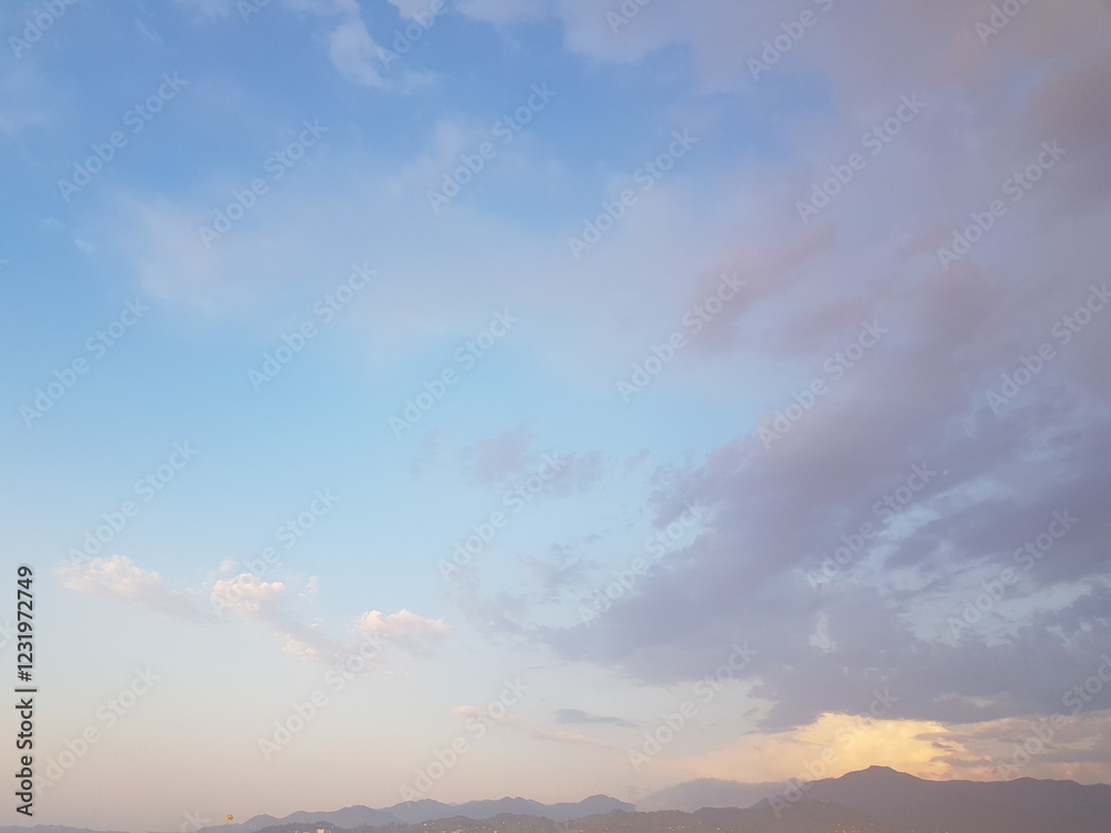 Wall mural pastel colour sky, dawn background. blue sky with clouds and sun light