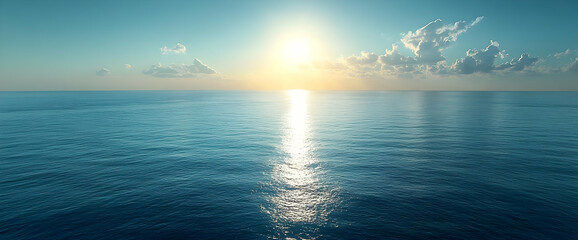 Obraz premium Ocean Sunset: Serene Blue Water With Golden Light Reflection