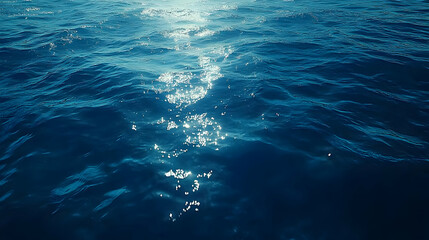 Obraz premium Deep Blue Ocean Water Surface With Sunlight Reflection