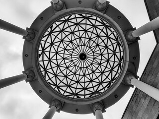  Ornamental Circle in the Sky: Rooftop and Concrete Pillars from a Low-Angle Perspective