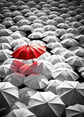 1 red umbrella in white umbrellas