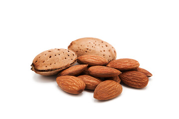 Organic fresh almond nuts isolated on white background.