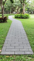 Serene Winding Stone Path in Lush Green Park Landscape