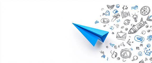 Blue paper airplane surrounded by hand-drawn sketches of digital icons and symbols on a white desk, representing creativity, communication, and innovation in business.