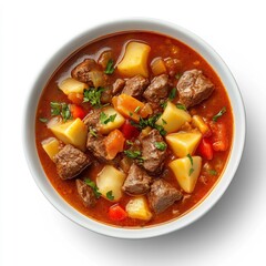 Hearty and Flavorful Hungarian Goulash Soup in a Bowl on White Background