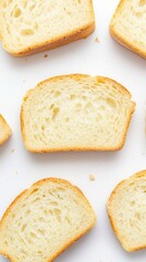Naklejka premium Sliced Soft White Bread Arranged on a Clean White Background