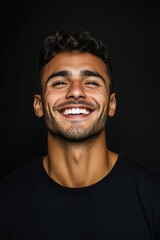 Man smiling with black shirt