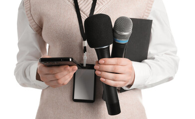 Journalist with microphones, smartphone and notebook on white background, closeup