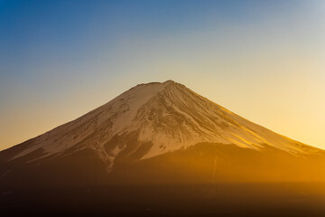 Fototapeta premium Sunset warm light over the mount Fuji in Japan