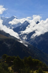 Hiking in the stunning Khumbu Valley surrounded by glaciars and snowy peaks in the Himalayan...