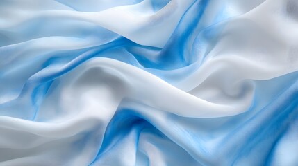 Obraz premium Serene Blue Silk Drape: Soft, flowing silk fabric in shades of white and light blue creates a visually calming and elegant texture. The subtle color gradation adds depth and sophistication.