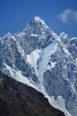 Hiking at the foot of Lhotse, Ama Dablam and Mount Everest in the Himalayan Khumbu Valley, Nepal