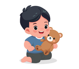 baby boy playing with teddy bear	