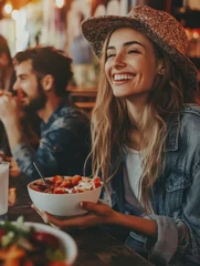  Young people eating brunch and drinking smoothie bowl at vintage bar - Happy people having a healthy lunch and chatting in trendy restaurant - Food trends and love concept - Focus on right girl face © Johannes