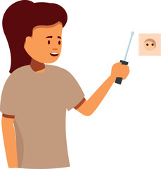 Young electrician installing electric outlet on a wall, using a screwdriver, during house maintenance work
