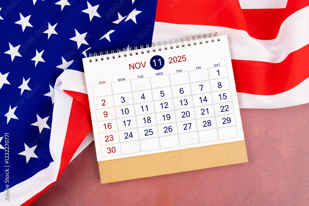 Wall mural November 2025 Monthly desk calendar and United States of America flag.